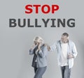 Message STOP BULLYING and mature couple
