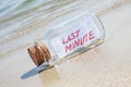 Message in a vintage bottle Last minute on beach. Royalty Free Stock Photo