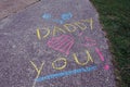 Message Written in Chalk on Sidewalk Royalty Free Stock Photo