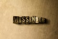 MESSENGER - close-up of grungy vintage typeset word on metal backdrop