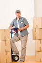 Messenger mature male courier delivering parcels Royalty Free Stock Photo