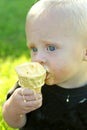 Messy Baby Eating Ice Cream Cone Royalty Free Stock Photo