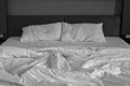 Messy bed sheets and pillow Royalty Free Stock Photo
