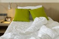 Messy bed sheets and pillow in the morning Royalty Free Stock Photo