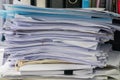 Messy business documents piles on office desk Royalty Free Stock Photo