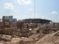 Messy and busy construction site. Commencing with ground and foundation work.