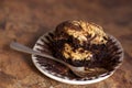 Messy Chocolate Peanut Butter Swirled Cupcake on marble Background