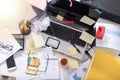 Messy and cluttered desk, light effect Royalty Free Stock Photo