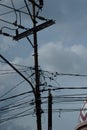 messy electrical and telephone cables Royalty Free Stock Photo