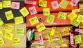 Messy file folder,sticky notes and old papers.Red tape, bureaucracy,overworked,burn out,exploitation,messy office and chaotic Royalty Free Stock Photo