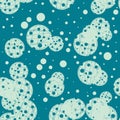 Messy green on blue holey grunge dot seamless pattern. Randomly dotted background.