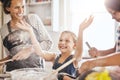 Messy, happy and children baking with mother for teaching and being crazy with flour. House, excited and girl kids with Royalty Free Stock Photo