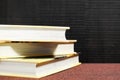 A messy heap of books on the bookshelf in the library