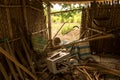 Messy Junk in Abandoned Chicken Coop - Old Plastic Chair - Wood, Hose and Basket - Asian Tree House and Garden