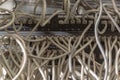 Messy network cabling at switch router cabinet. Royalty Free Stock Photo