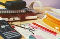 Messy Office desk laptop calculator diary lamp budget debit credit cards Royalty Free Stock Photo