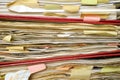 Messy old file folders and documents,government, business ,overwork,red tape and bureaucracy concept