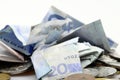 Messy pile of euro banknotes and coins Royalty Free Stock Photo