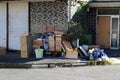 Messy Stuff stored in front of Japanese house in Beppu