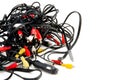 Messy tangle of wires for video on a white background isolated, bundle of audio video electrical leads Royalty Free Stock Photo