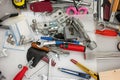 Messy tool desk top view scattered and unorganized work tools no people