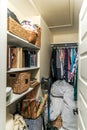 A messy and unorganized walk in closet