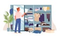 Messy wardrobe with clutter and young man, mess and disorganized clothes chaos in open closet. Student standing in front