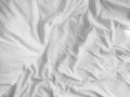 Messy white bed sheets