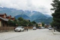 Streets of the tourist town of Mestia of the Svaneti region with classic houses surrounded by the Caucasus Mountains