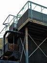 Abandoned derelict industrial building with rusting steel girders tanks and pipes