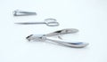 Cuticle clippers, small cuticle scissors and nail nippers on a white background. Royalty Free Stock Photo