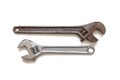 Metal adjustable wrenches, old and new, on white background Royalty Free Stock Photo