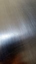 Metal. Aluminum. Sheet metal with rivets. Metal plate with rivets. Metallic surface. Industrial background