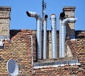 Metal ans brick smoke stacks Royalty Free Stock Photo