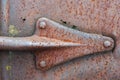 Metal arrow riveted on a rusty steel sheet Royalty Free Stock Photo