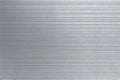 Metal background or texture of brushed steel plate with reflections Iron plate Royalty Free Stock Photo