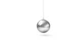 A metal ball on a thread is like a pendulum on a white background. Space for text. Royalty Free Stock Photo