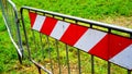 metal barriers with red decorations for greater evidence, used to mark off interrupted roads Royalty Free Stock Photo