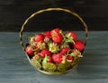 Metal basket full of ripe strawberries Royalty Free Stock Photo