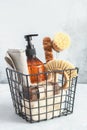 Metal basket with natural cleaning products and tools. Bamboo accessories and natural products for cleaning the kitchen Royalty Free Stock Photo