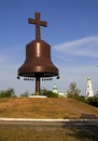 Metal bells and cross silhouette Royalty Free Stock Photo