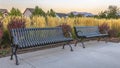 Metal benches on a beautiful park in Daybreak Utah Royalty Free Stock Photo