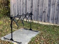 Metal bicycle stand on a concrete slab Royalty Free Stock Photo