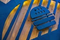 Metal black colored burger sign on wooden backdrop