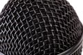 Metal black microphone grill macro, extreme closeup, reflective surface simple background texture, backdrop. Recording vocals Royalty Free Stock Photo