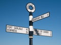 A metal, black and white signpost at Boustead Hill on the Solway Coast, Cumbria, UK.