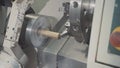 Metal blank machining process on lathe with cutting tool