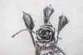 metal bouquet of roses and calla lilies forged by a blacksmith as a decoration for the house and garden