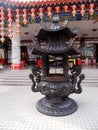 The Metal bowl for offering candles in Buddhist temples Kuala Lumpur, Malaysia Royalty Free Stock Photo