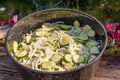 Metal bowl with sliced pickles Royalty Free Stock Photo